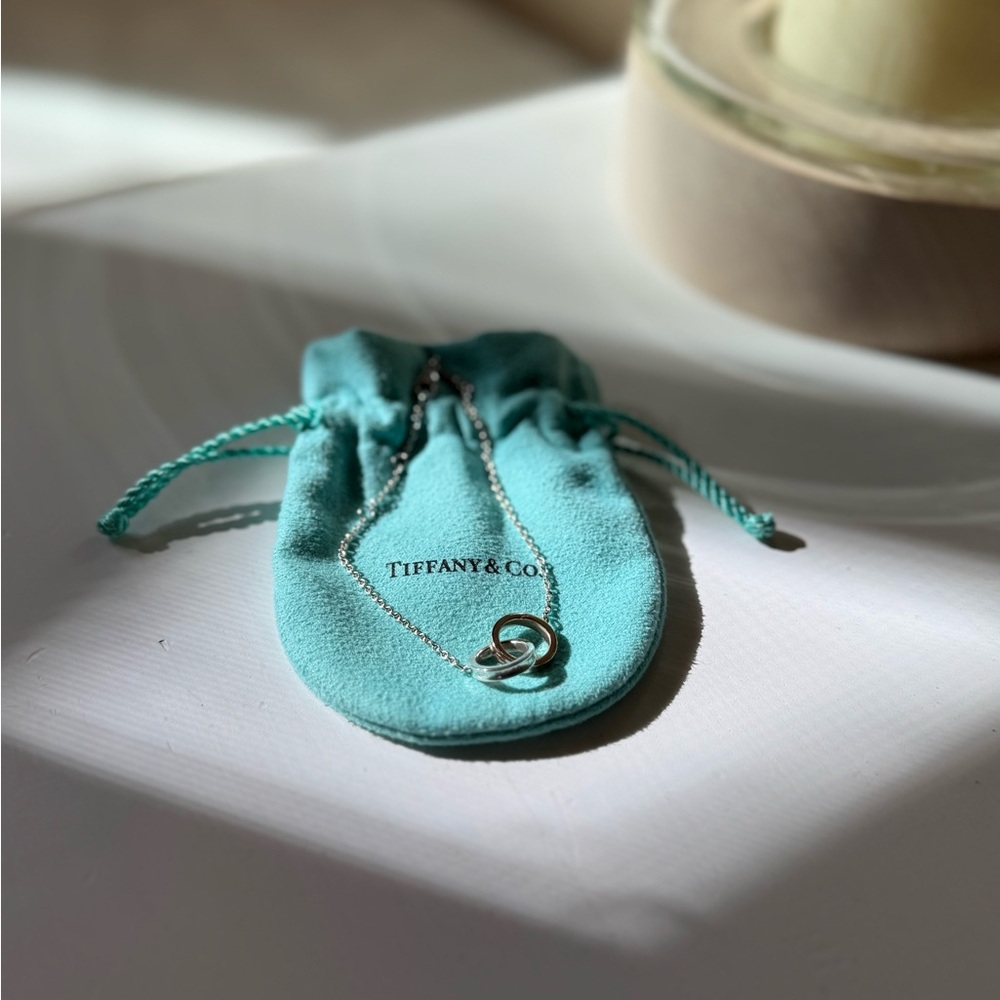 Tiffany & Co. Interlocking Bracelet with Blue Signature Bag